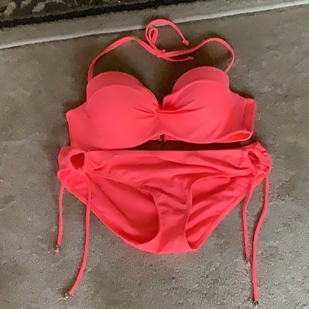 Hot pink bikini size 10/12 small C cup NWOT stretchy. Sexy gold balls on…